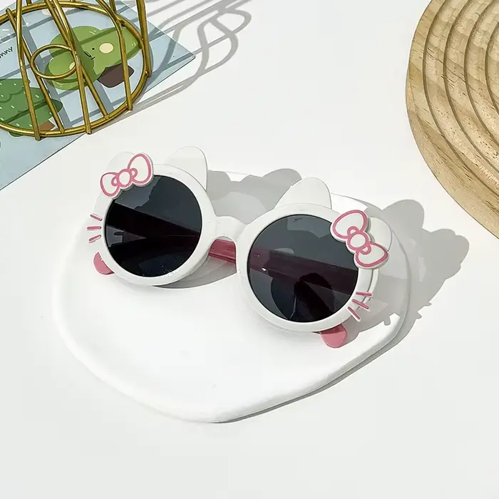Lunettes de soleil d'été ornées d'arc pour filles, jolies lunettes protégées contre les UV, lunettes