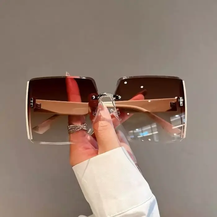 Lunettes de soleil rétro carrées sans cadre pour femmes