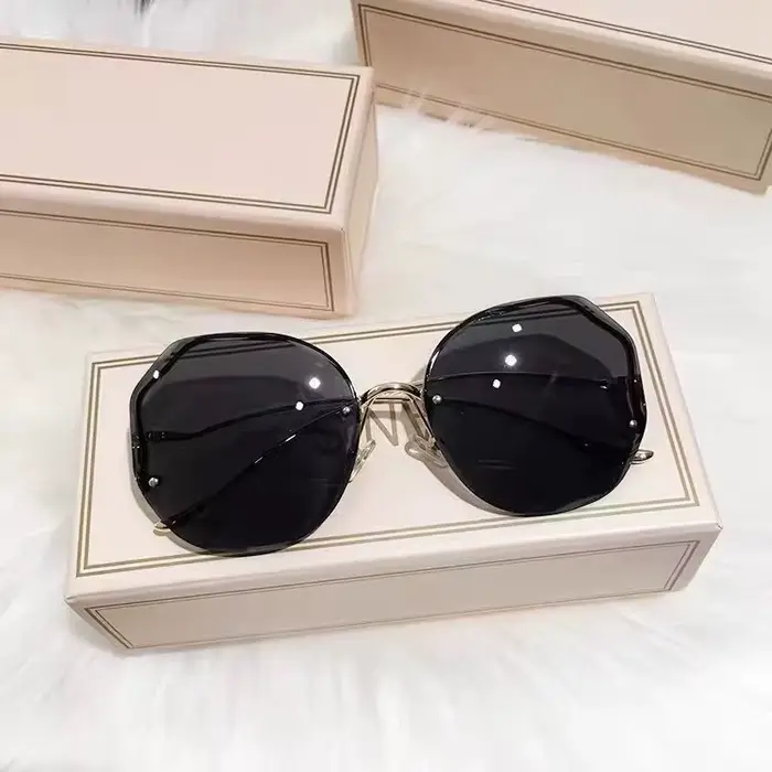 Lunettes de soleil à bords découpés sans cadre pour femmes