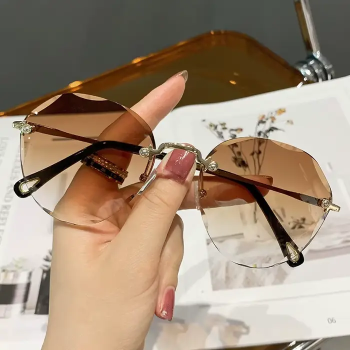 Lunettes de soleil rondes sans monture classiques pour femmes