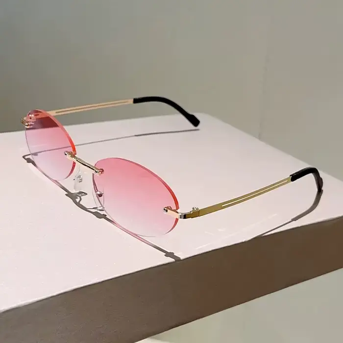 Lunettes de soleil ovales sans monture tendance