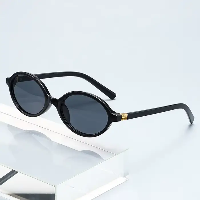 Petites lunettes de soleil ovales tendance à motif léopard pour femme
