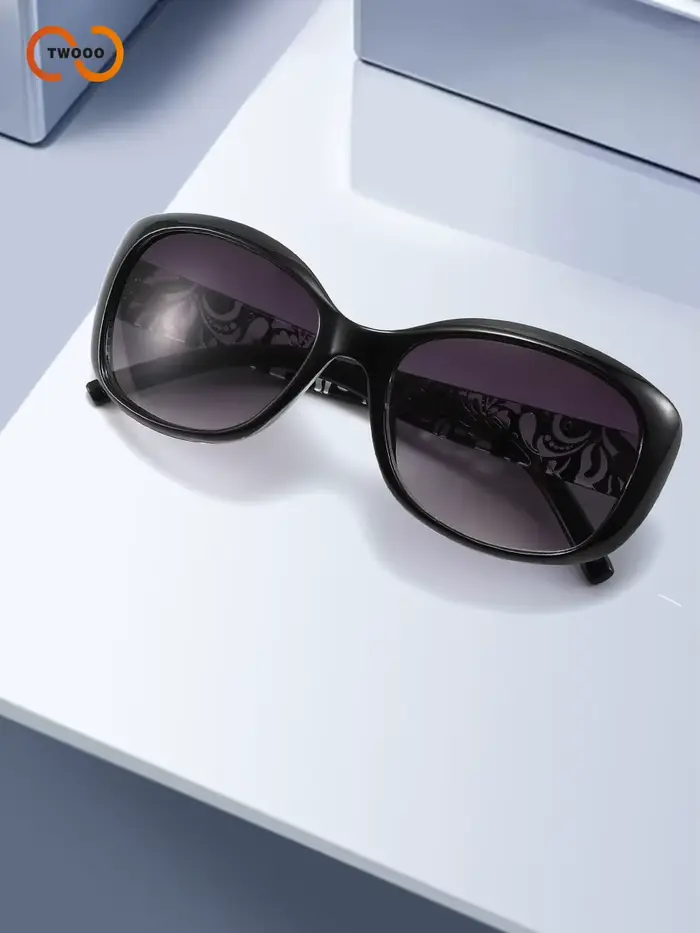 Lunettes de soleil élégantes à grande monture ovale pour femmes avec motif unique