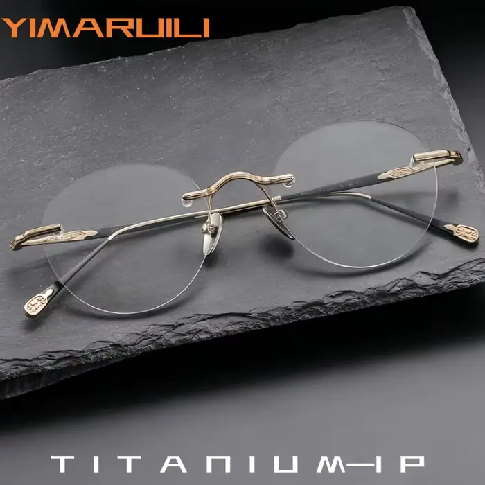 YIMARUILI Lunettes Rétro Rondes en Titane Sans Monture pour Hommes et Femmes