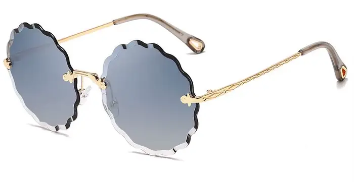 2025 marque de luxe concepteur dame ronde sans monture lunettes de soleil femmes diamant coupe lenti